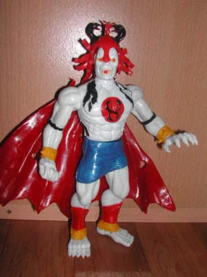 Masked figure. White and red with a cape, only loosely a ThunderCat at all.