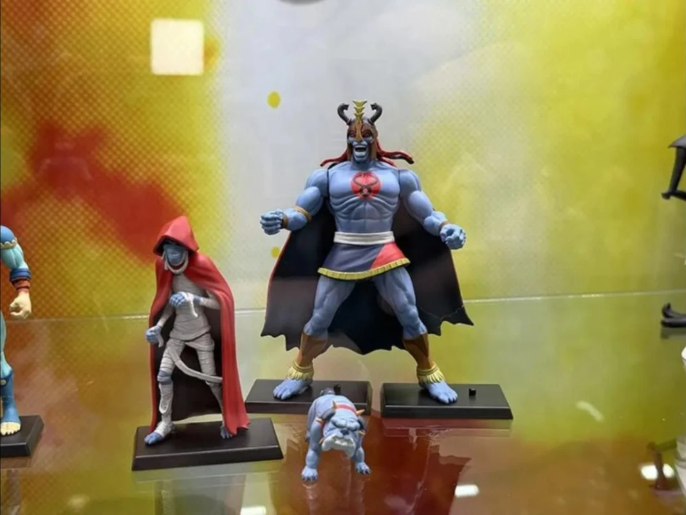 Mezco's ThunderCats display at NYCC 2026 with Mumm-Ra the Ever-Living standing beside decayed Mumm-Ra in his red hood and Ma-Mutt
