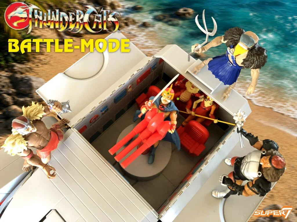 The Toy Color ThunderTank in battle mode with the cargo bay open and figures aboard