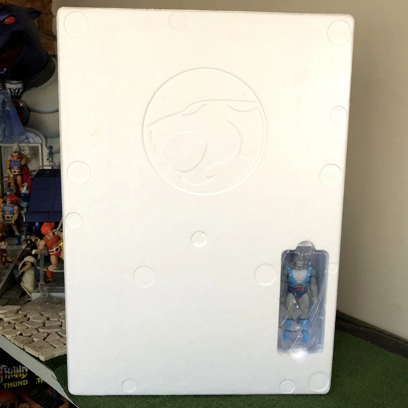 The white polystyrene inner tray with the Panthro blister slotted into the side