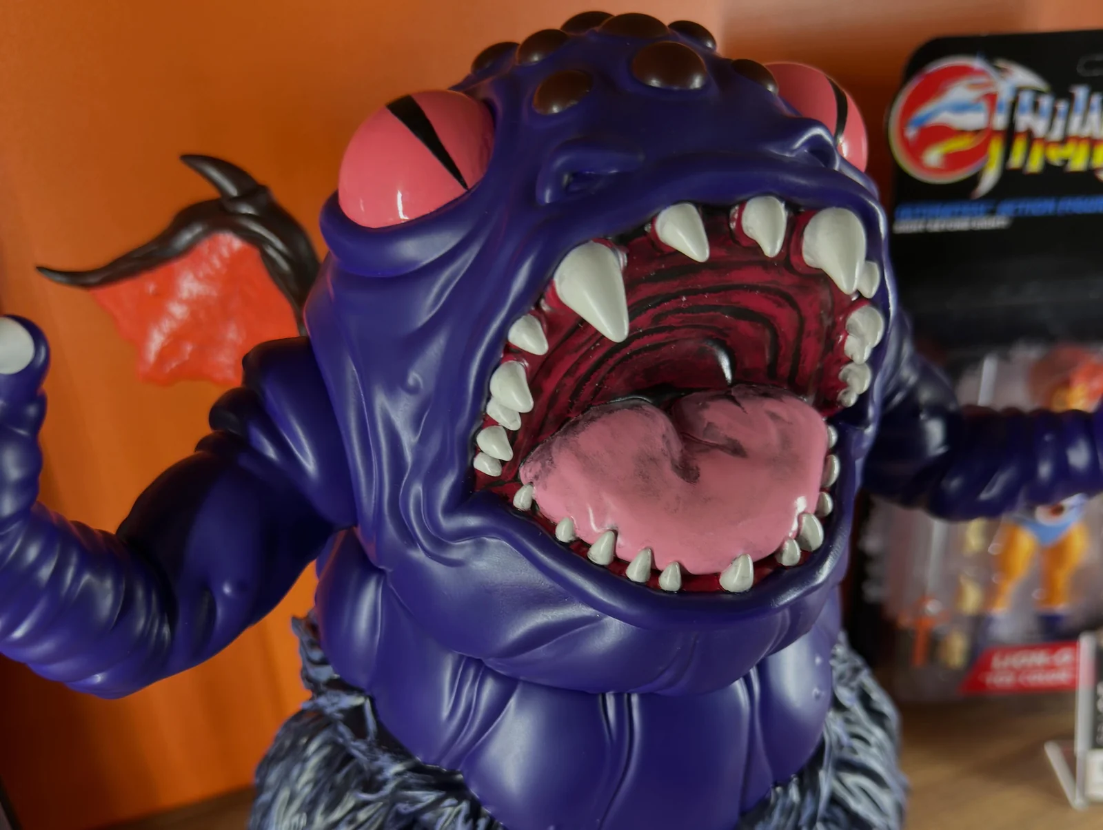 Close on the Astral Moat Monster open maw and fangs